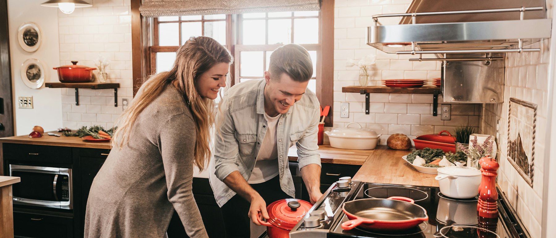 Couple cooking dinner together at home