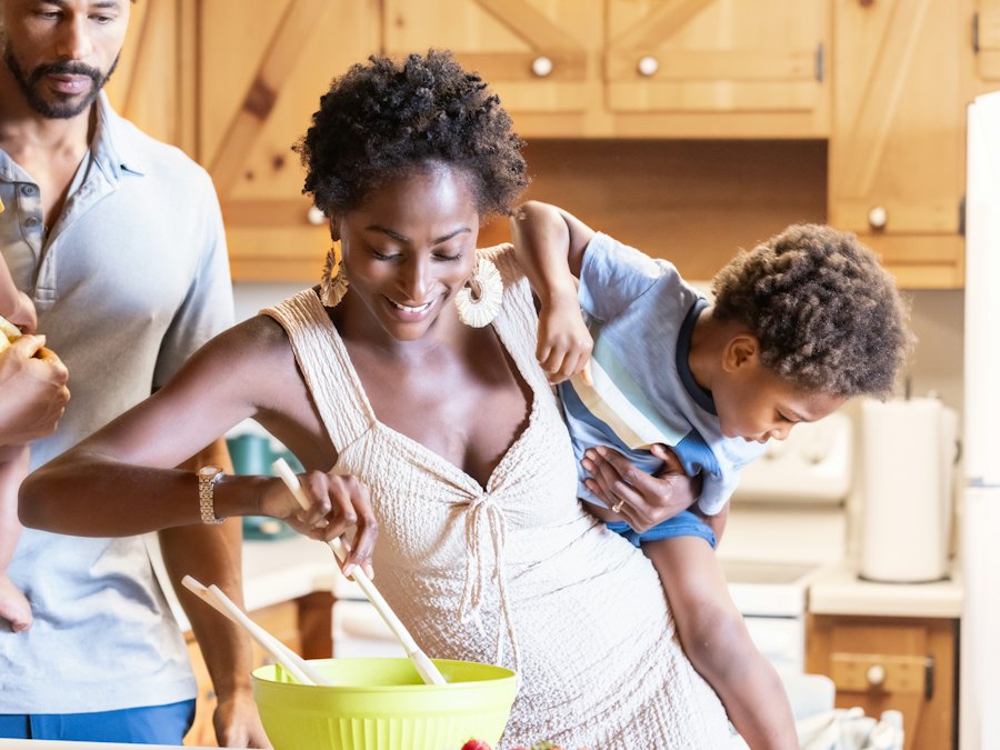 Family cooking together in the kitchen