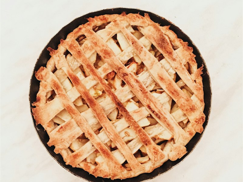 Freshly baked apple pie with a golden lattice crust
